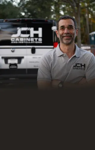 Image of John from JCH Cabinets with his wrapped van.